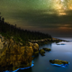 Illustration for article titled Behold the Ghostly Glow of a Bioluminescent Coastline Under the Milky Way
